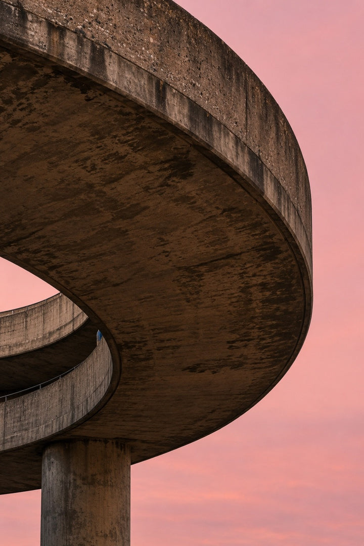 Concrete Curve, Dusk, the unframed sheet. A ramped concrete spiral seen from below against a pink dusk sky.